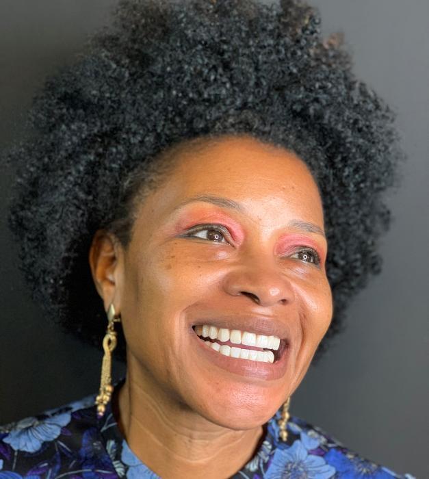 Patient smiling after dental implant procedure in Towson MD