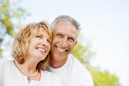 Married couple smiling at Roland Park in Towson MD