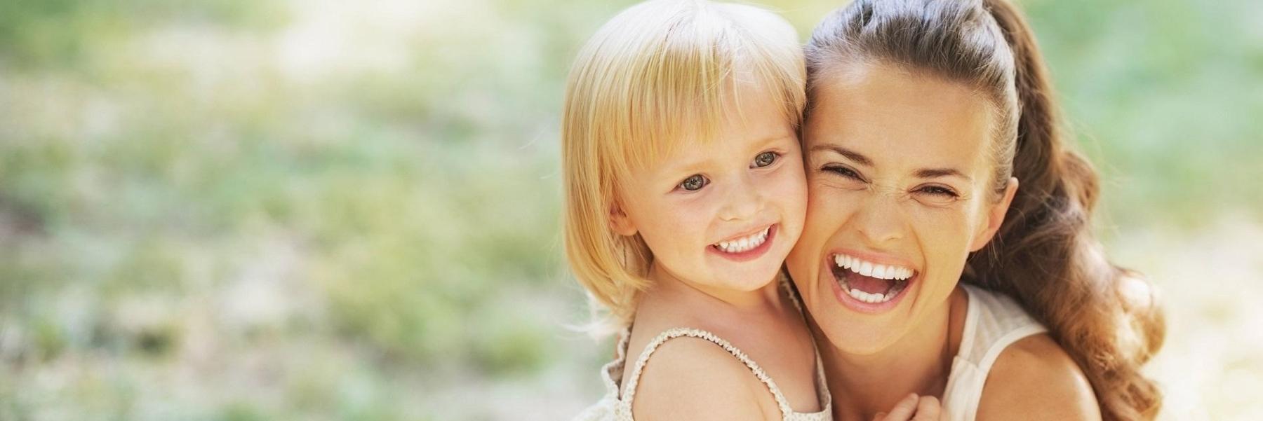 Mother and child smiling at Roland Park in Towson MD