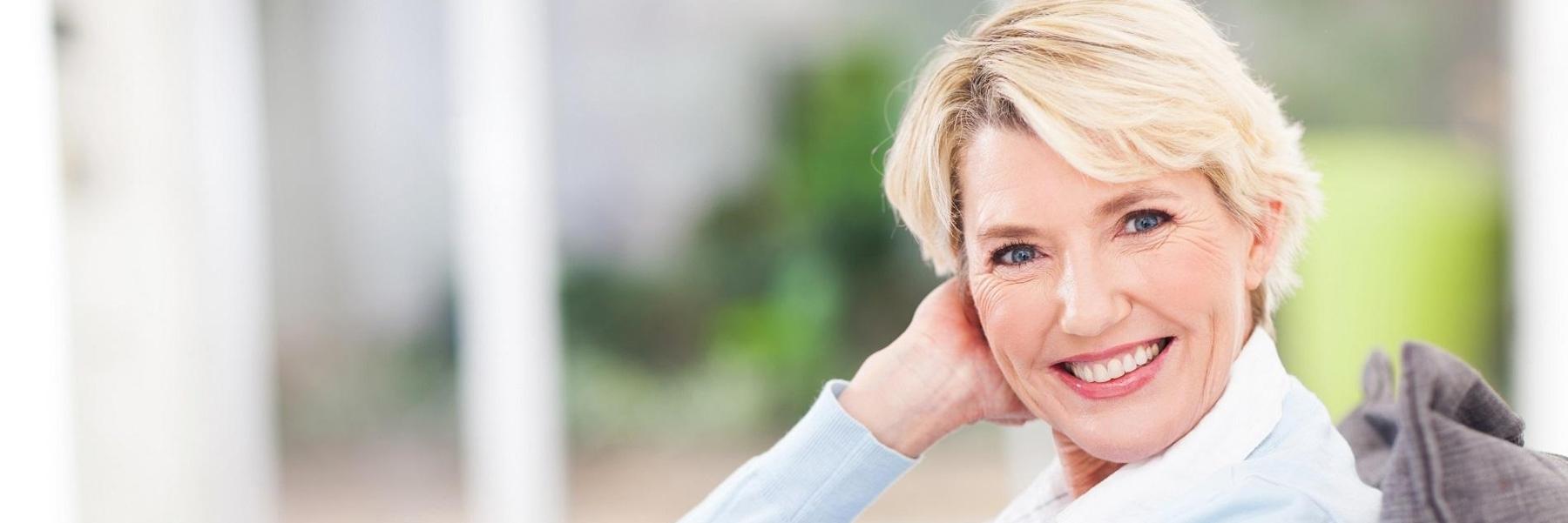 Woman smiling at dentist near me Towson MD